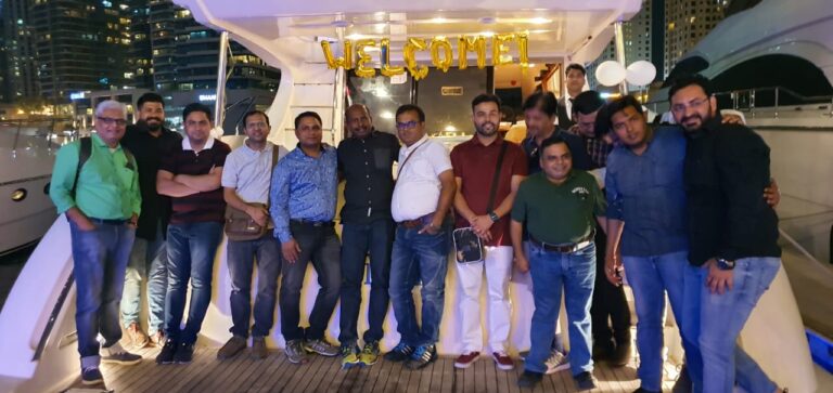 group of men at party on yacht